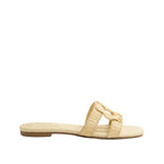 The Simkhai Monogram Raffia Flat Slide is a beige slip-on sandal featuring a woven texture and wide strap, ideal for upgrading your casual look with its signature Simkhai detailing.