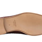 The bottom view of the elegant Herrera Woven Loafer shows a smooth tan sole with edge stitching and a black heel. The size and brand name, Magnanni, appear near the arch, adding sophistication.