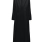 A Dorothee Schumacher Sophisticated Volumes Dress, black, long-sleeved, silk with a high neckline, a back zipper, and reaching midi-length.