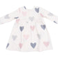 The Angel Dear AD Modal Rib Simple Dress + Bloomer is a long-sleeve white baby dress with large pink, blue, and gray hearts and front buttons. This cozy outfit is perfect for any occasion.