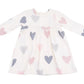The Angel Dear AD Modal Rib Simple Dress + Bloomer features a white long-sleeve design with pink and gray heart patterns scattered across the cozy fabric.