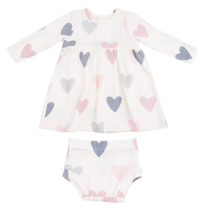 The Angel Dear AD Modal Rib Simple Dress + Bloomer set features a cozy white long-sleeve dress with matching bloomers, both adorned with pink, blue, and grey heart patterns.