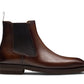 Magnanni Lonny Chelsea boot in dark brown full-grain leather with side elastic panels and a low heel.