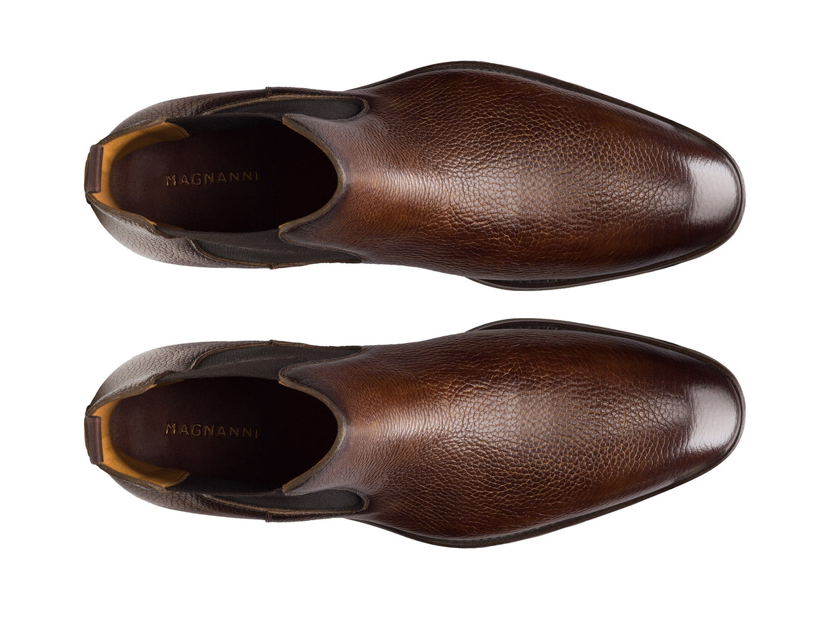 Top-down view of a pair of textured full-grain leather Lonny Chelsea boots with elastic side panels.