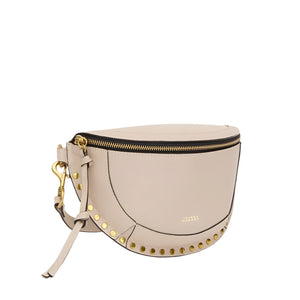 The Isabel Marant Skano Belt Bag, beige in color, showcases gold studs, a zip closure, and an adjustable strap, crafted from calfskin leather.