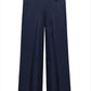 Dorothee Schumacher Trench It Up Pants in navy blue are wide-leg trousers made from silk twill, featuring an elastic waistband and two back pockets, one of which has a button closure.