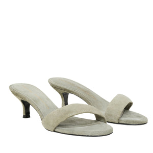 Dorothee Schumacher's Suede Sensation Kitten Heel: light gray suede open-toe sandals with a single wide padded strap across the front.