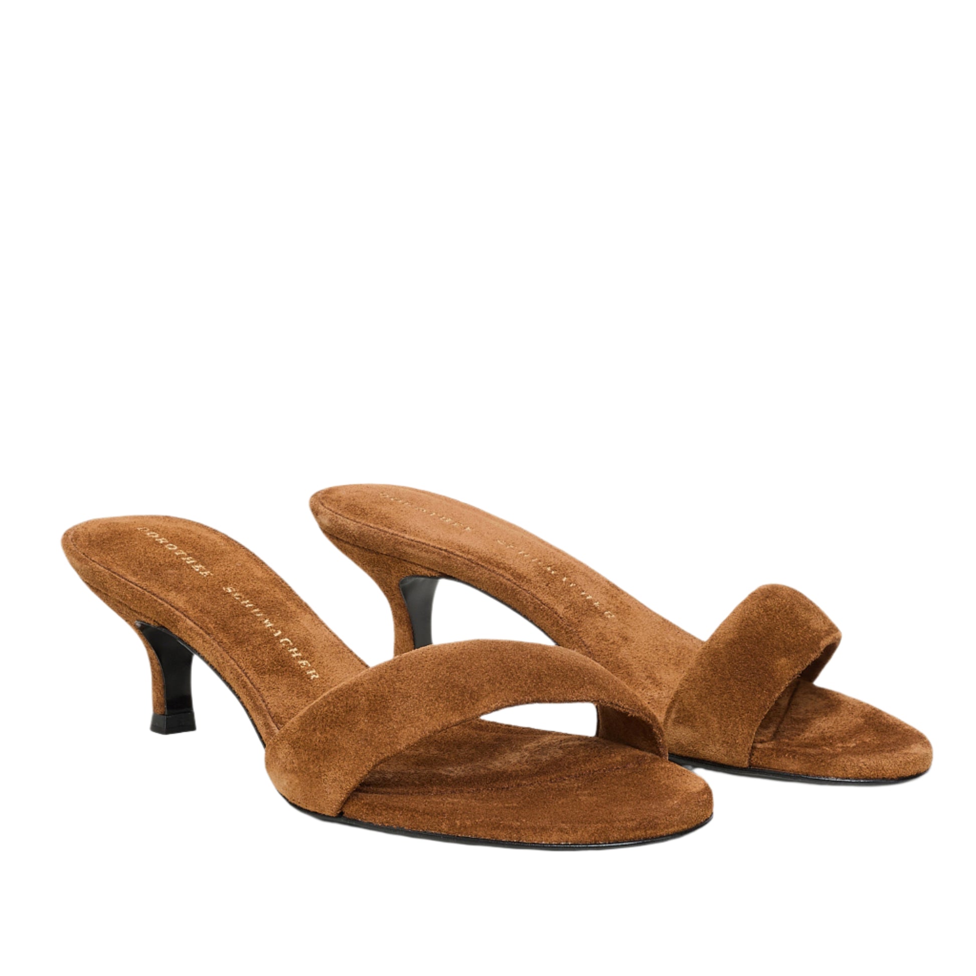 Dorothee Schumacher's Suede Sensation Kitten Heel is a pair of brown suede heeled mules featuring open toes, slim heels, and softly padded straps.