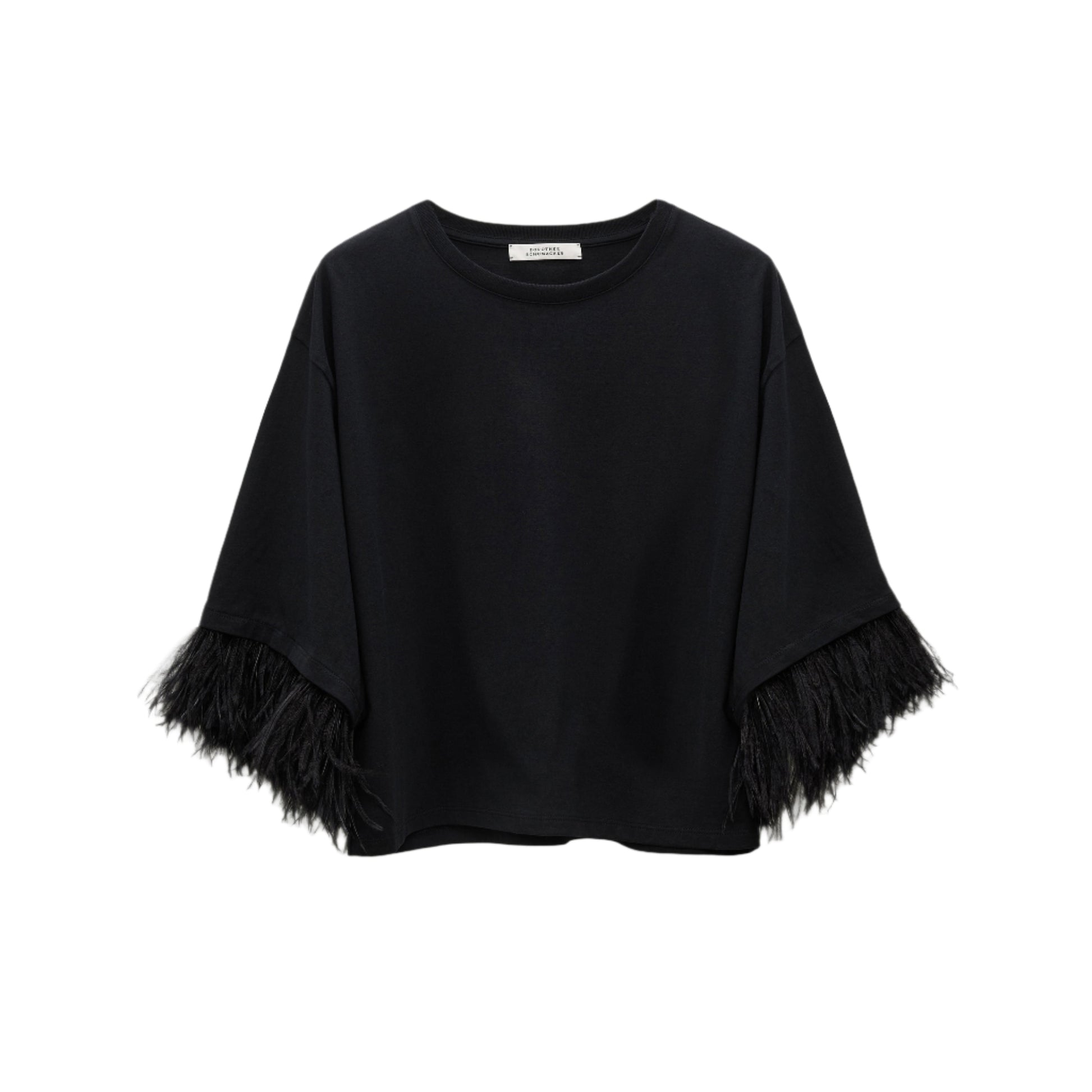 The Dorothee Schumacher Feminine Favorites Shirt is a black, short-sleeve boxy cotton tee with wide sleeves and black ostrich feather trim at the cuffs, shown against a white background.