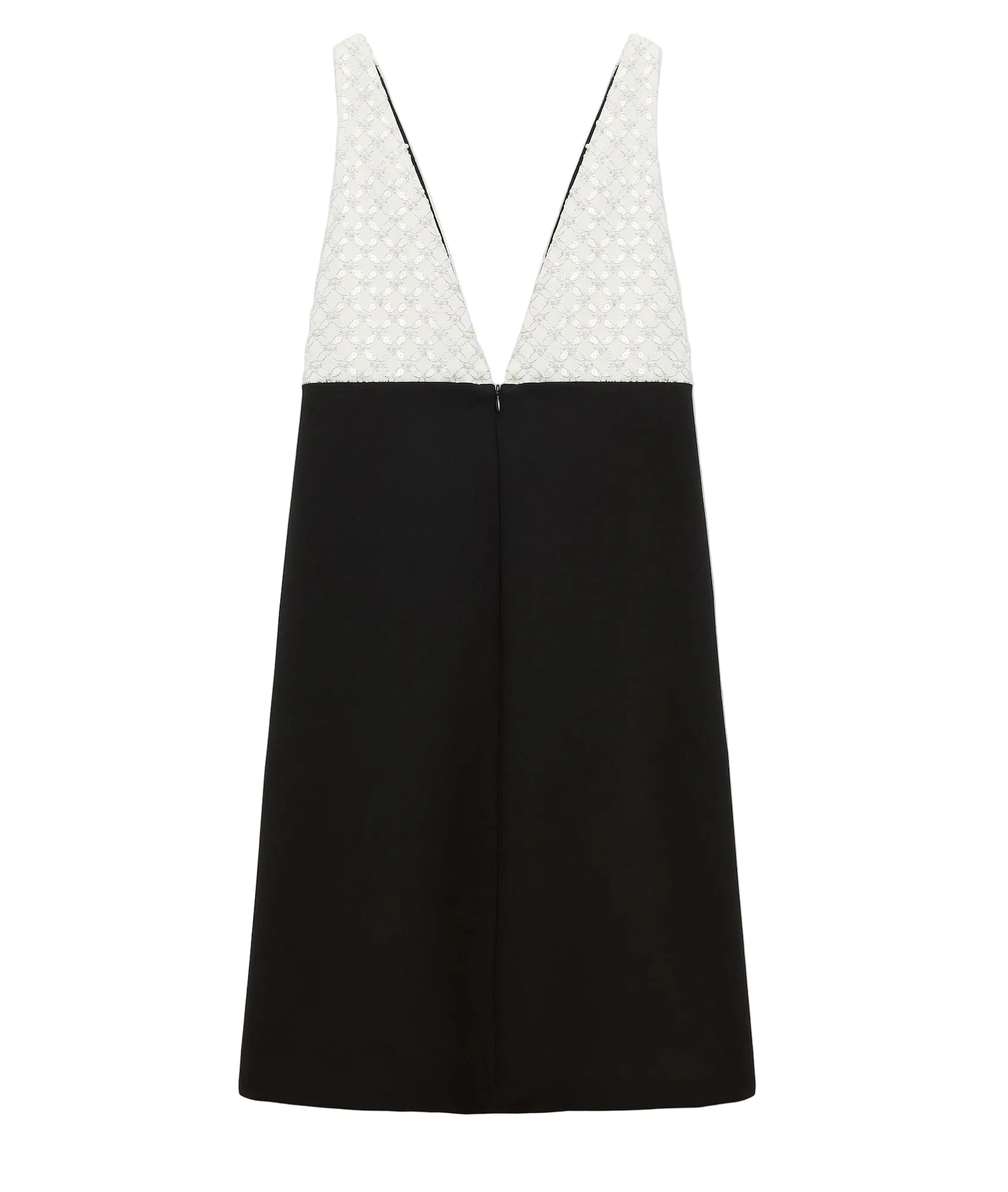 The Emotional Essence Dress by Dorothee Schumacher is a sleeveless Punto Milano style with a deep V neckline, featuring a white textured top and solid black bottom.
