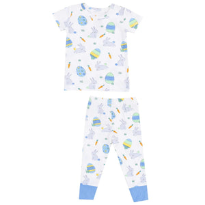 Angel Dear's Easter Bunnies Short Sleeve Loungewear Set features white pajamas with blue accents, adorned with purple bunnies, decorated eggs, and carrots. The set includes long pants for a cozy fit, ideal for snug PJs lovers.