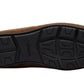 The Monterey Braid Bit Driver Loafer by Magnanni features a supple calfskin upper and a textured black rubber sole with angular patterns and grooves for excellent grip. "MAGNANNI" is prominently displayed on the sole, blending style with tradition in each step.