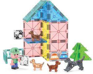 The Magnatiles Puppy Park 27-Piece Set lets kids build a two-story house with toy dogs, a tree, a human figure, and pet-themed accessories—perfect for creative play with pet pals.