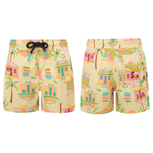 Pepita & Me Baby Boys' and Boys' Casitas Isleñas Amarillo Swim Trunks in yellow showcase a vibrant tropical house and palm tree print, quick-dry fabric, elastic waistband, black drawstring, with front and back views.