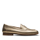 The Sonya Metallic Loafer by Magnanni features gold metallic leather, an apron toe, low wooden heel, and penny slot detail. Shown in profile on a white background.
