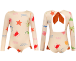 Two Pepita & Me Baby Girls' and Girls' Knot LS Rashguard swimsuits feature long sleeves, beige fabric with colorful sea-themed prints (crabs, starfish, plants), UPF50+ sun protection, and a back cutout with a large rust-colored bow.