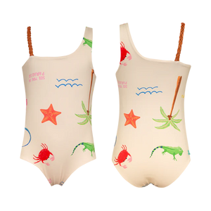 The Pepita & Me Girls' Marea One Piece features braided straps and tropical prints—starfish, crab, palm tree, and iguana—in green, orange, and red on a cream background. Perfect for summer adventures!.