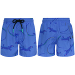 Front and back views of Pepita & Me Baby Boys' and Boys' Lobito Isleño Swim Trunks in blue, featuring a playful lizard print, black drawstring, back pocket with button closure, and quick-dry fabric for comfy swims.