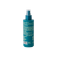 A teal Barberino's Texturizing Sea Salt Spray bottle with a clear cap, shown from the back, displays white instructions—ideal for easy beach waves.