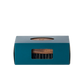 The Barberino's Beard Brush with natural bristles is partially visible through the rectangular window of its teal box, which features a circular cutout on top.