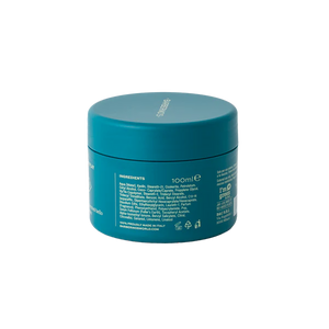 A teal 100ml jar of Barberino's Matt Cream shown from the back displays its ingredients, product info, recycling and cruelty-free symbols. It offers anti-frizz benefits for a smooth, polished look.