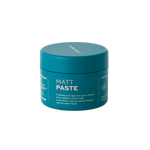A teal Barberino's Matt Paste container with white text and a twist-off lid, ideal for textured hairstyles and a matte finish, is photographed against a plain white background.