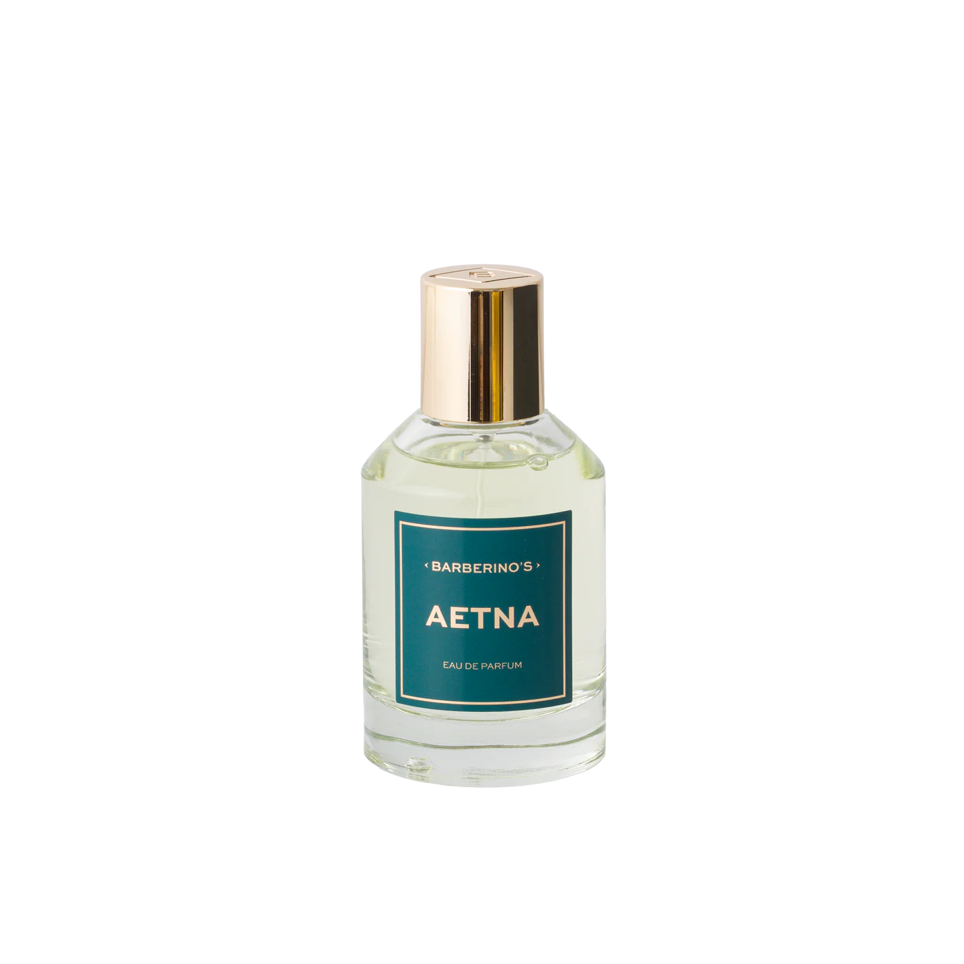 A clear glass bottle of Barberino’s Aetna Perfume Cologne, featuring a green label and gold cap, is photographed against a white background. Inspired by Sicily’s Mount Etna.