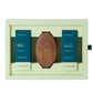 The Barberino's Beard Grooming Set includes beard shampoo, nourishing balm, and a wooden brush, all in a light green box—perfect for complete beard care.