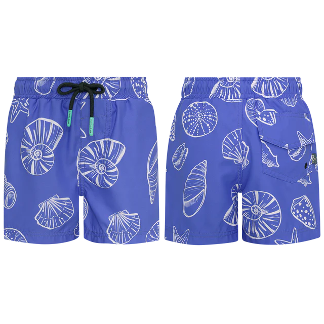 Pepita & Me Baby Boys' and Boys' Playa Azul Swim Trunks shown in blue with white seashell and starfish print, featuring an elastic waistband, back pocket, and quick-dry fabric for all-day comfort.