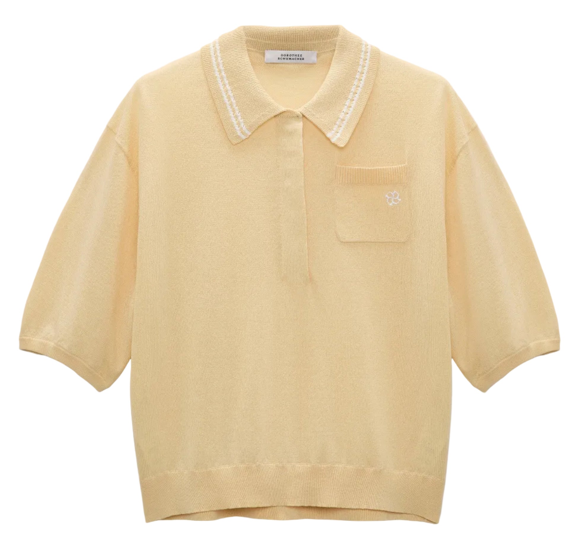 The Refined Essentials Pullover by Dorothee Schumacher is a light yellow short-sleeve polo in stretch cotton, featuring a collar, front buttons, small chest pocket, and a subtle embroidered logo on the pocket.
