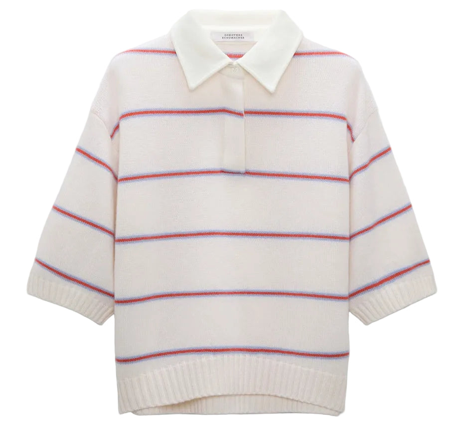 The Sporty Statements Pullover by Dorothee Schumacher is a cropped, boxy Merino-cashmere knit top in cream with a polo collar, half sleeves, and thin red and blue horizontal stripes.