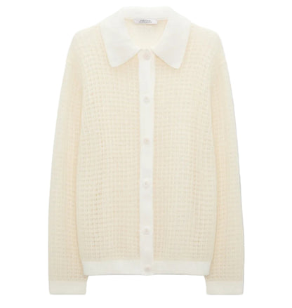 The Airy Softness Cardigan by Dorothee Schumacher is a cream alpaca-wool piece featuring long sleeves, a waffle-knit texture, button front, and a large pointed collar.