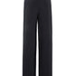 Back view of Dorothee Schumacher’s Casual Attraction Pants in black, featuring a relaxed wide-leg fit, elastic waistband, and two rear welt pockets.