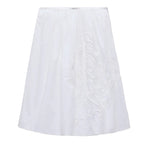 The Embroidered Beauty Skirt by Dorothee Schumacher is a white cotton A-line skirt with one-side delicate floral embroidery, a fitted waistband, crochet trim, and knee-length hem.