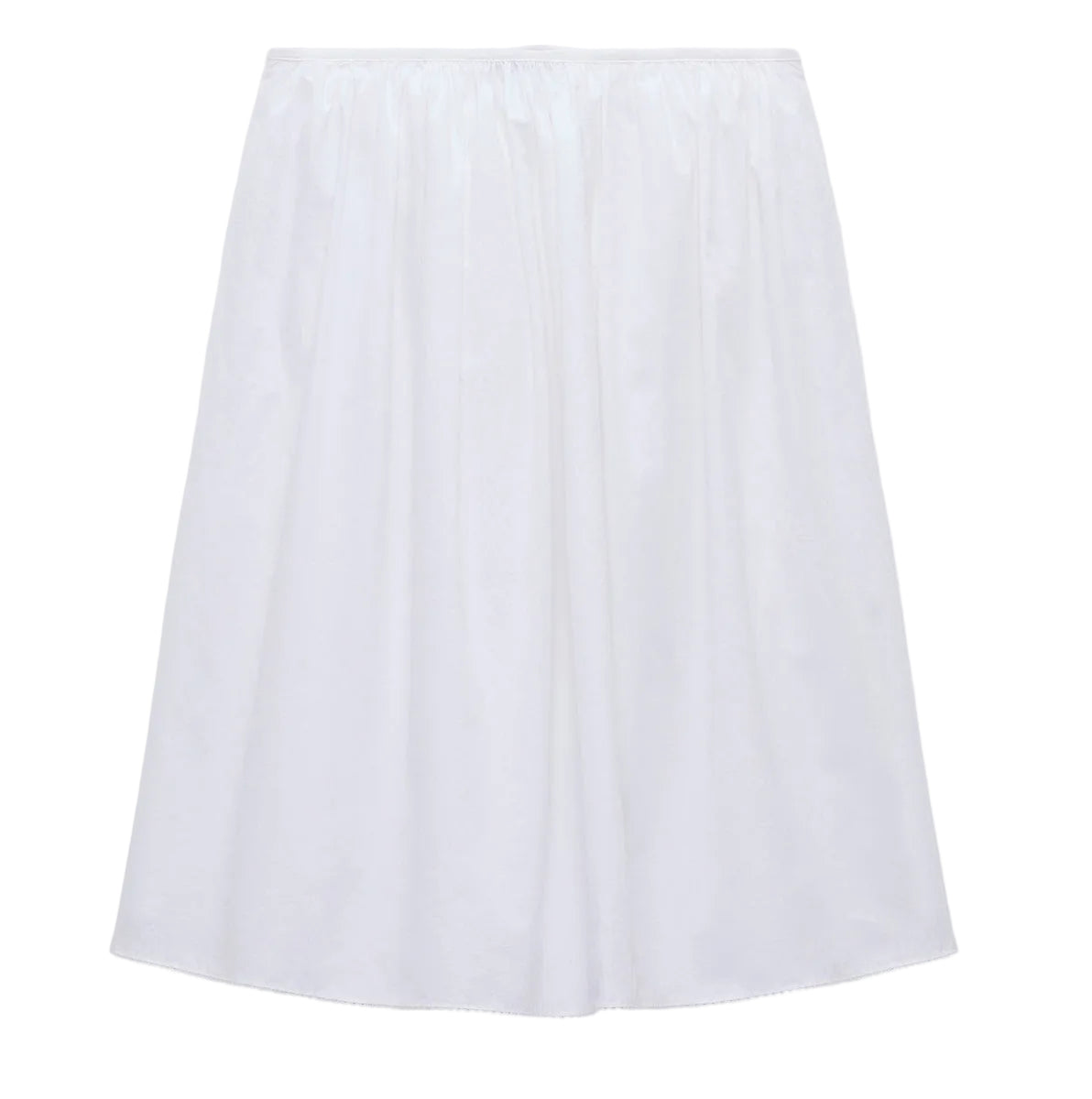 The Dorothee Schumacher Embroidered Beauty Skirt is a white knee-length slip with an elastic waistband and delicate crochet trim, shown against a white background.
