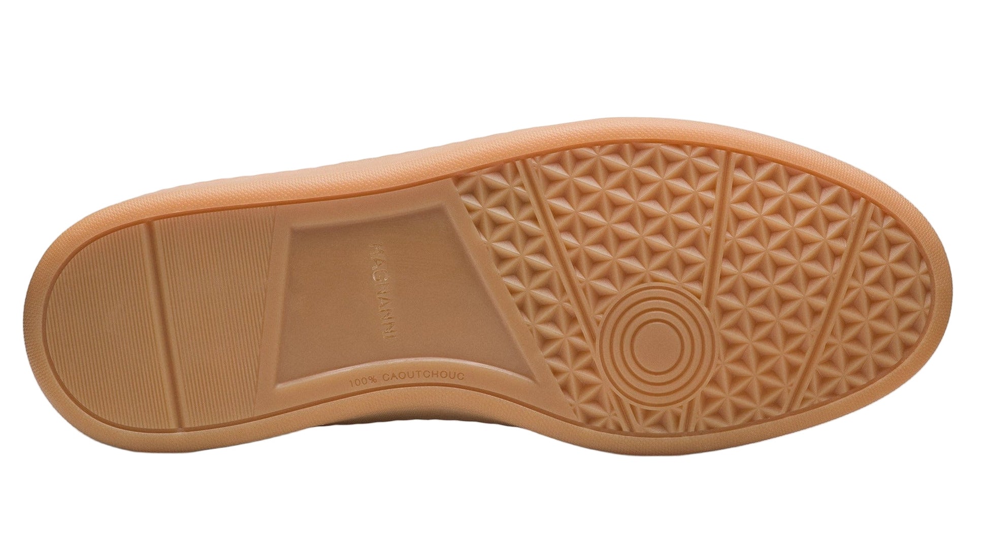 The Zori Sneaker by Magnanni features a light brown rubber sole with vintage-inspired geometric tread patterns, including circular and triangular designs, plus a rectangular grip at the heel.