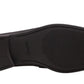 The image showcases the sole of the Gentry Soft Bit Loafer by Magnanni in black, with a textured pattern and brand name elegantly stamped along the arch, reminiscent of a moccasin design.