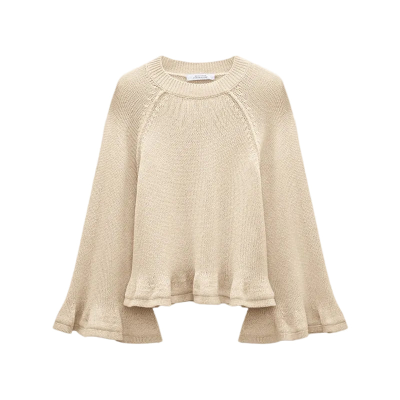 The Cotton Candy Pullover by Dorothee Schumacher is a beige knit cropped top with wide raglan sleeves and a loose, slightly ruffled hem, shown on a white background.