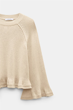 The Dorothee Schumacher Cotton Candy Pullover is a beige cotton top with raglan sleeves and a flared ruffled hem, shown against a plain light background.