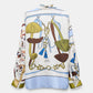 The Cosmic Funghi Blouse by Dorothee Schumacher is an effortless oversized silk twill blouse showcasing a vibrant nature-inspired print of mushrooms, leaves, and decorative ropes on a white background. This striking piece is distinguished by its signature mushroom motif for added charm.