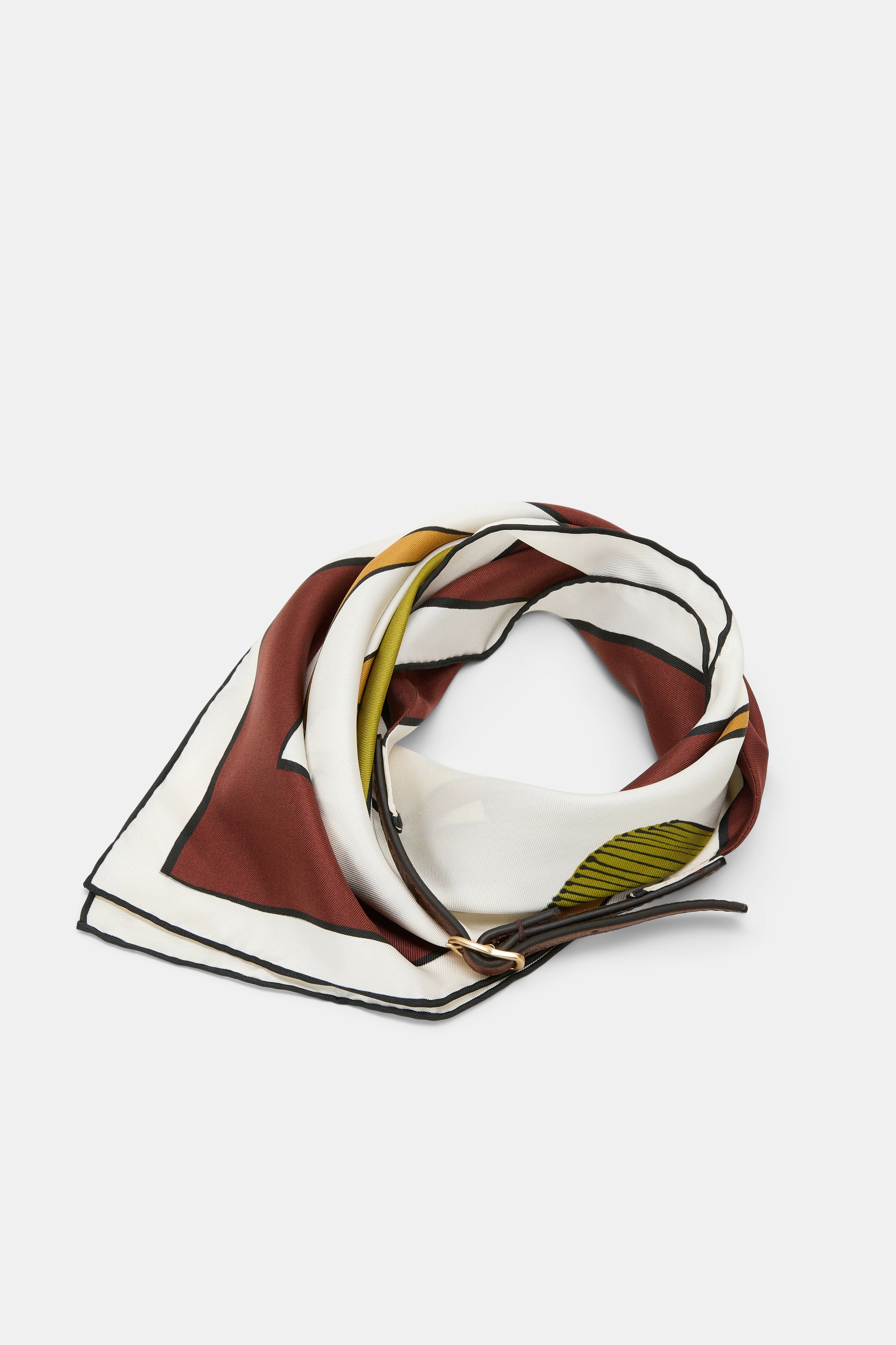 Introducing the Cuoio Softness Scarf Belt by Dorothee Schumacher, a luxurious silk accessory showcasing a geometric pattern in white, brown, yellow, and black, artfully folded and presented on a simple white backdrop.