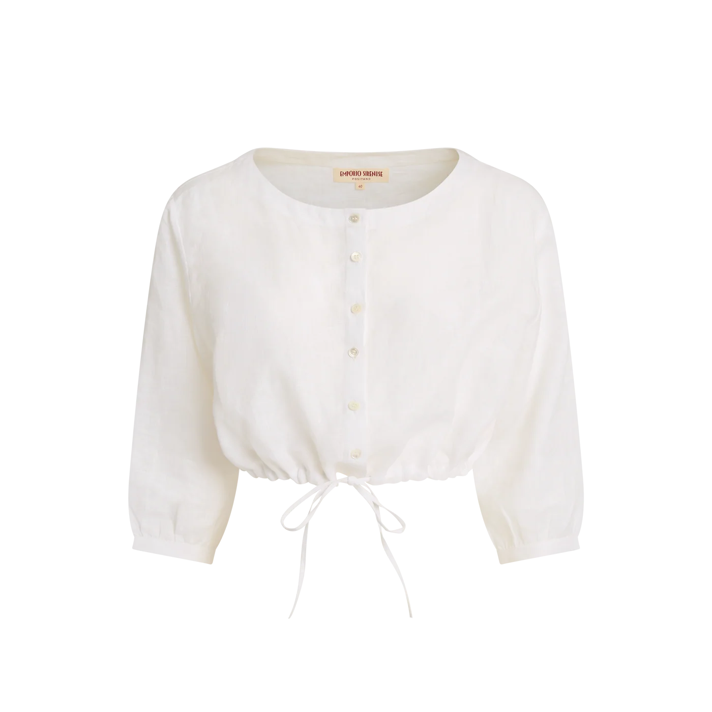 Emporio Sirenuse presents the New Jinny Blue Horizon Top, a white long-sleeve button-up blouse with a round neckline and adjustable drawstring hem, inspired by the relaxed elegance of a linen cropped top, shown on a plain background.