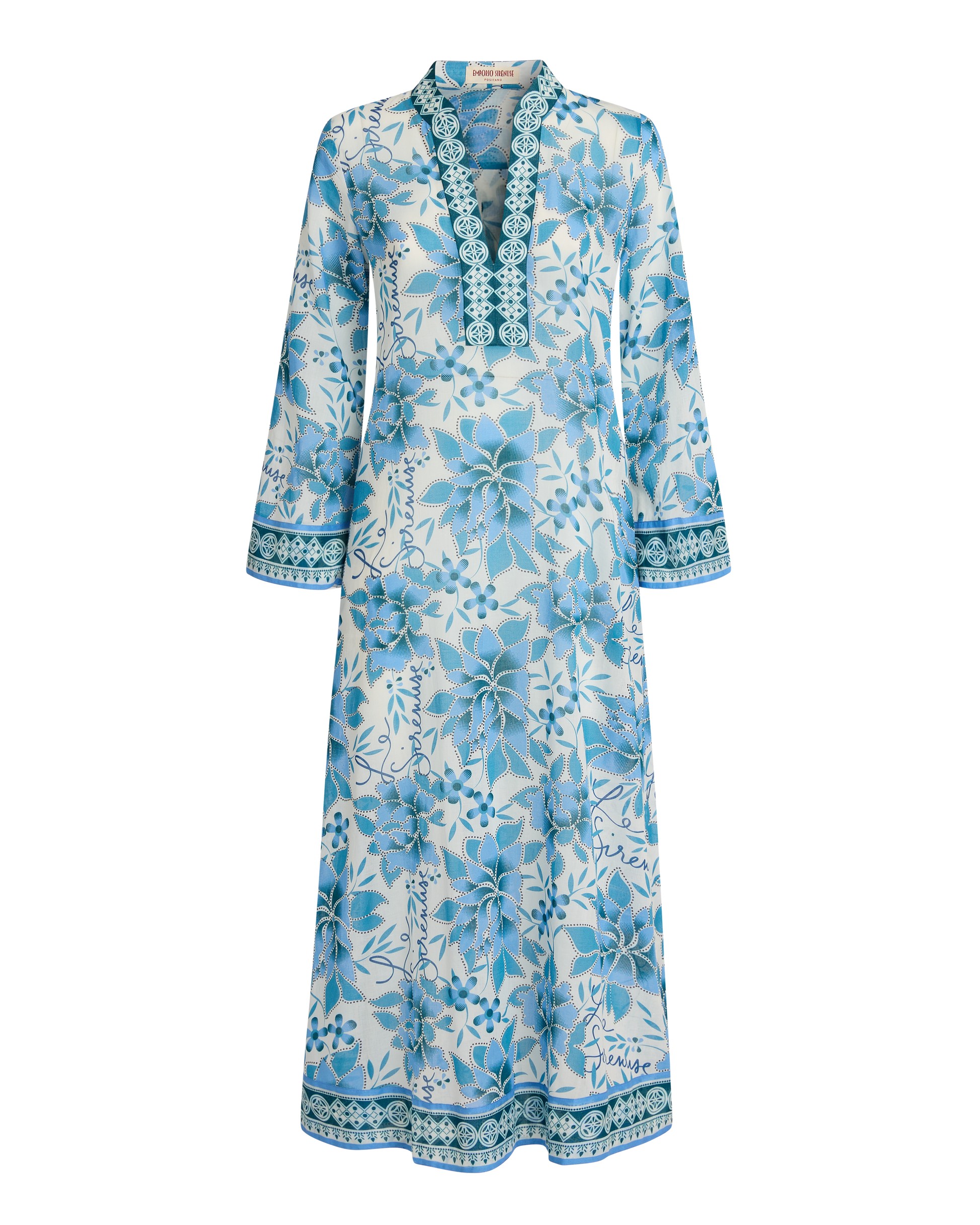 The Emporio Sirenuse Jenna Eastern Dream Dress is a long-sleeve, ankle-length cotton voile caftan with a blue print and decorative trim on the neckline, cuffs, and hem, shown against a white background.