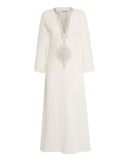 The Jenna Meridiana Dress by Emporio Sirenuse is a long-sleeve white linen-cotton blend, detailed with blue and tan Meridiana embroidery along the V-neck and chest for a touch of effortless elegance.