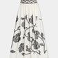 Emporio Sirenuse Ombretta Peony Embroidery Skirt in cream-colored cotton poplin, featuring black peony embroidery and a black patterned waistband.