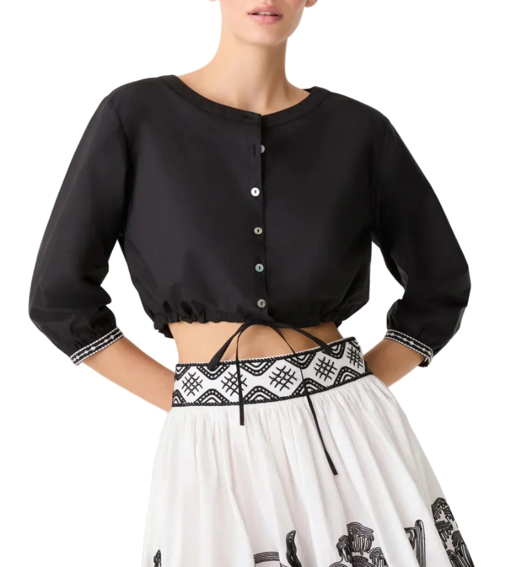 New Jinny Peony Embroidery Top: a black cropped, button-down cotton poplin blouse with three-quarter sleeves, worn with a white high-waisted skirt featuring black peony embroidery.