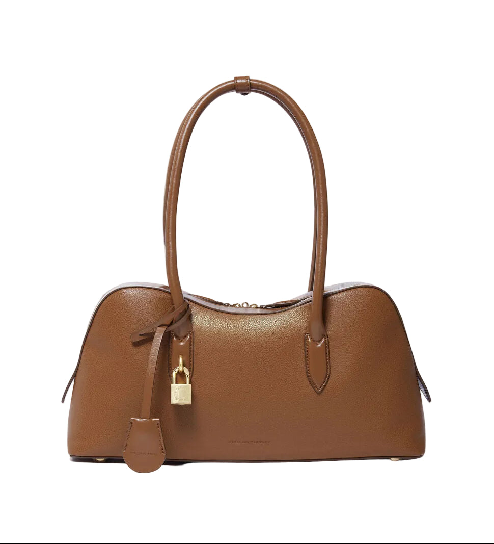 The Ryder Shoulder Bag by Stella McCartney is a brown vegan bag with two handles, gold-tone lock and hardware, and a structured rectangular shape displayed on a white background.