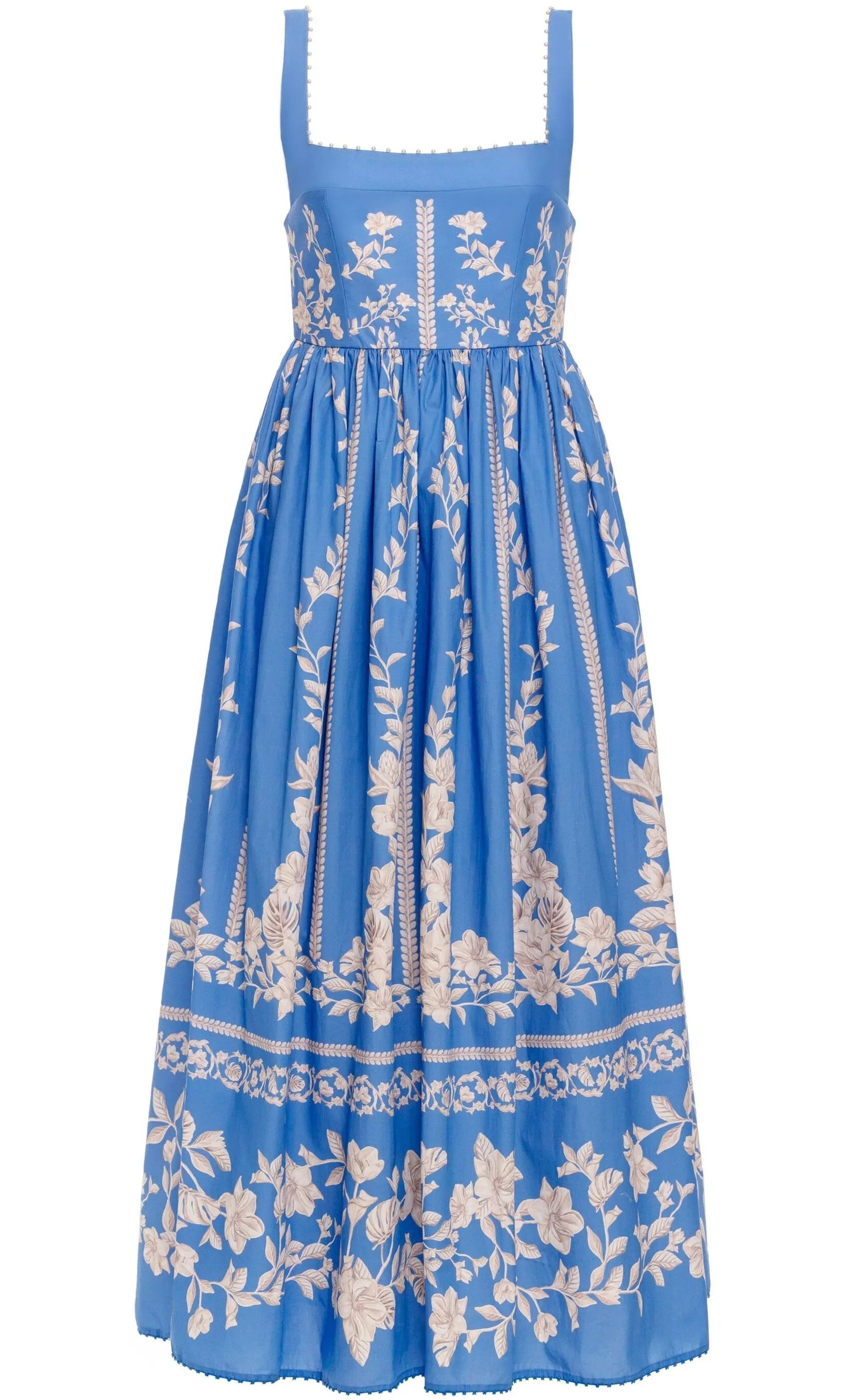The Barbara Dress by Agua By Aguabendita is a sleeveless blue midi dress with a square neckline, fitted bodice, ivory floral embroidery, an A-line silhouette, and a full gathered skirt.