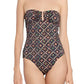 Person wearing an Ulla Johnson Monterey Maillot One Piece, which showcases a strapless design adorned with a geometric pattern in multiple colors and features a subtle sweetheart neckline.