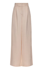 The TWP Hudson St Pant is a beige wide-leg style with a high waist, belt loops, and a concealed front zip closure, shown against a plain white background.